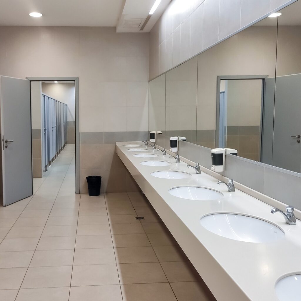 Commercial Plumbing - installing new water and drainage lines in a commercial building by licensed plumbers.