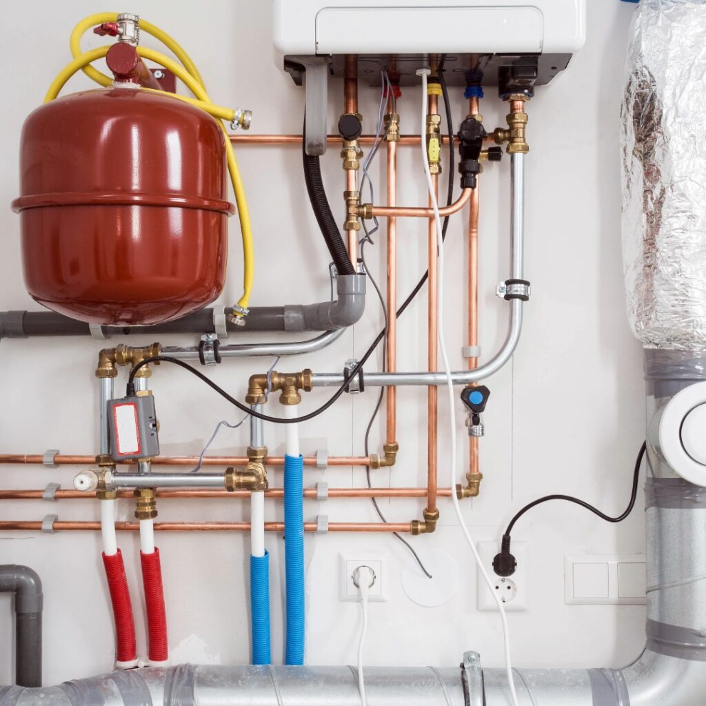 Boiler Installation - expert technicians installing and testing boiler units for consistent home heating.